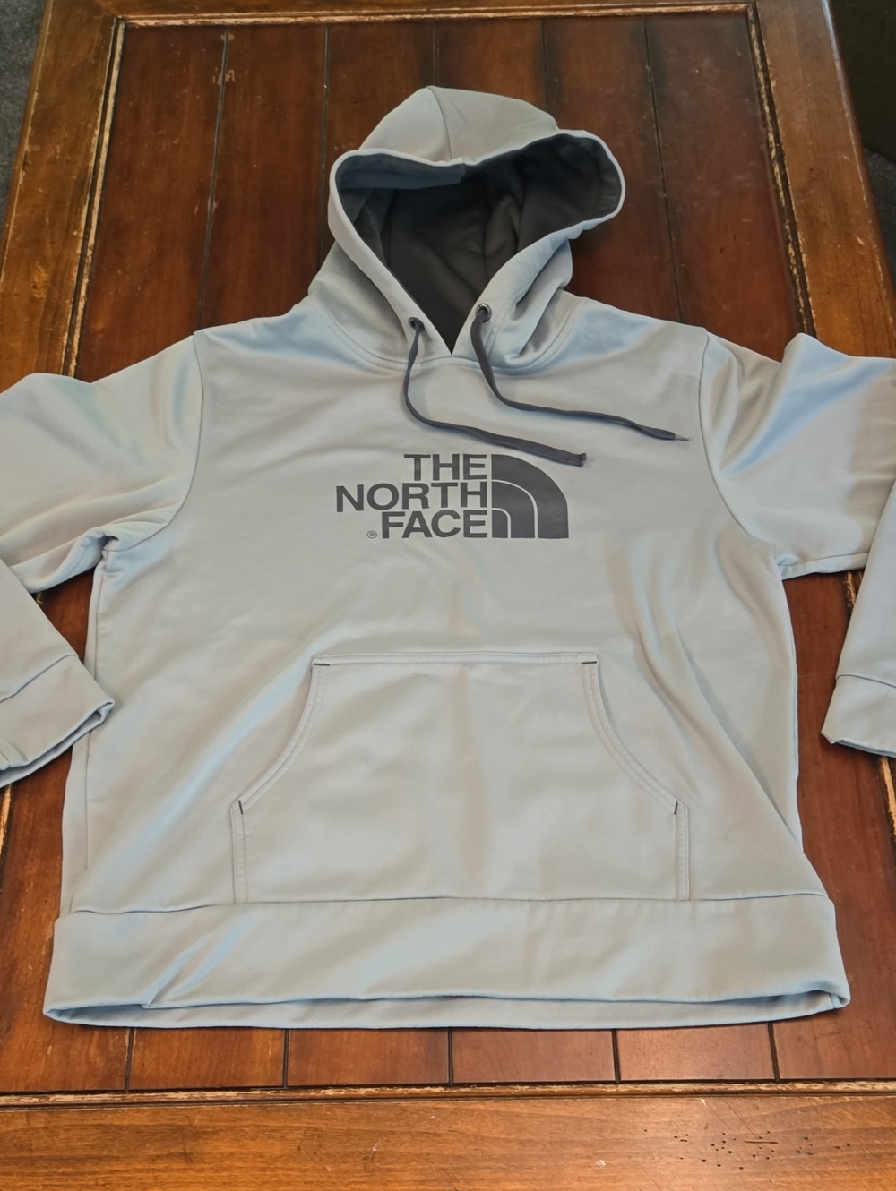 The North Face Pale Blue Pullover Hoodie with Gray Logo